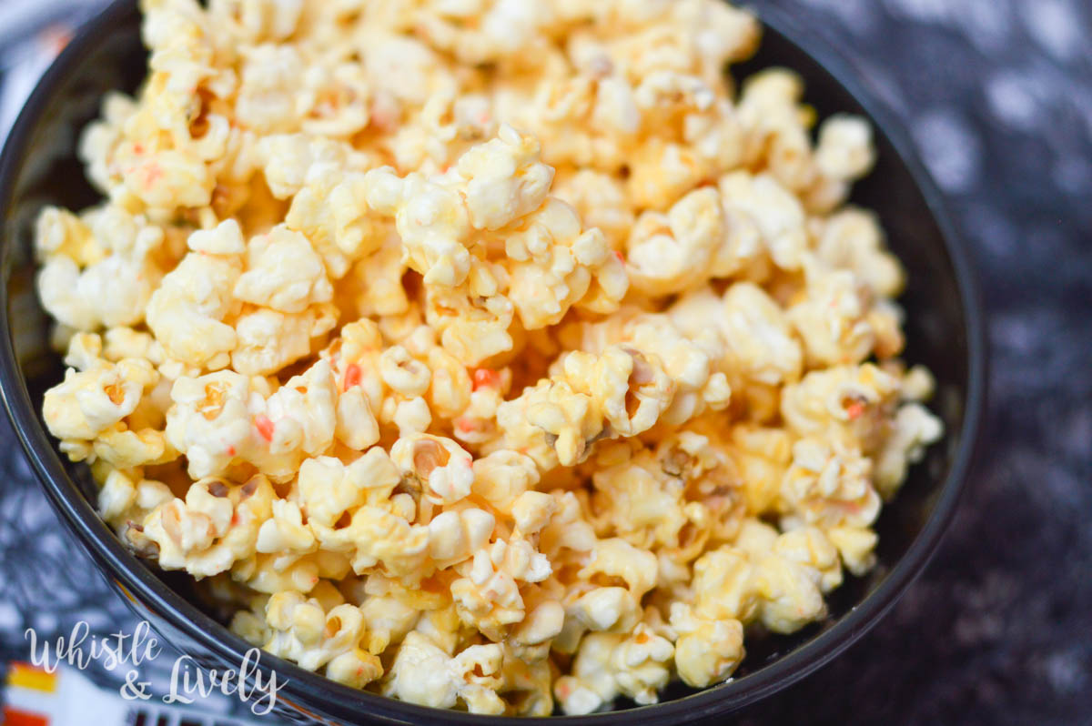White Chocolate Candy Corn Popcorn - The perfect balance of sweet and salty, this candy corn popcorn is sure to please even those who don't love candy corn. 