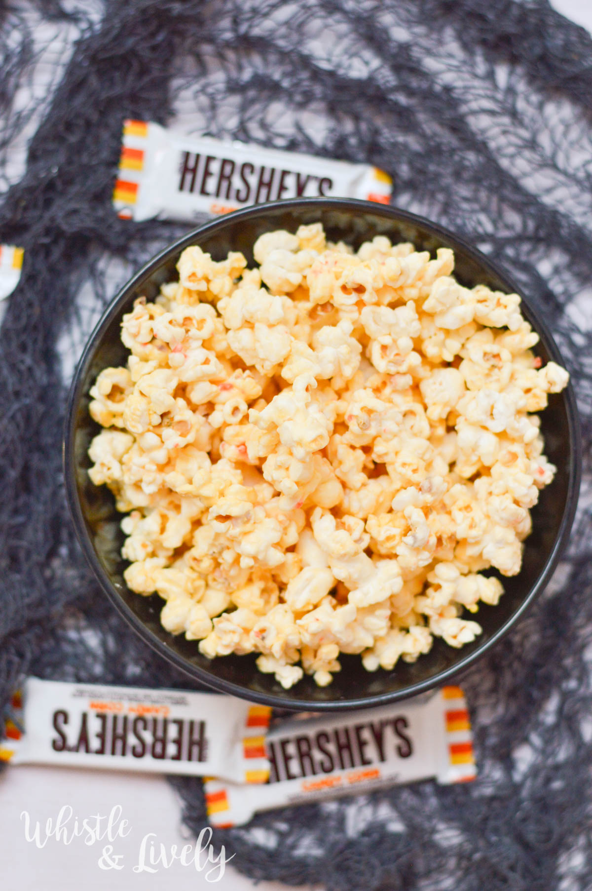 White Chocolate Candy Corn Popcorn - The perfect balance of sweet and salty, this candy corn popcorn is sure to please even those who don't love candy corn. 