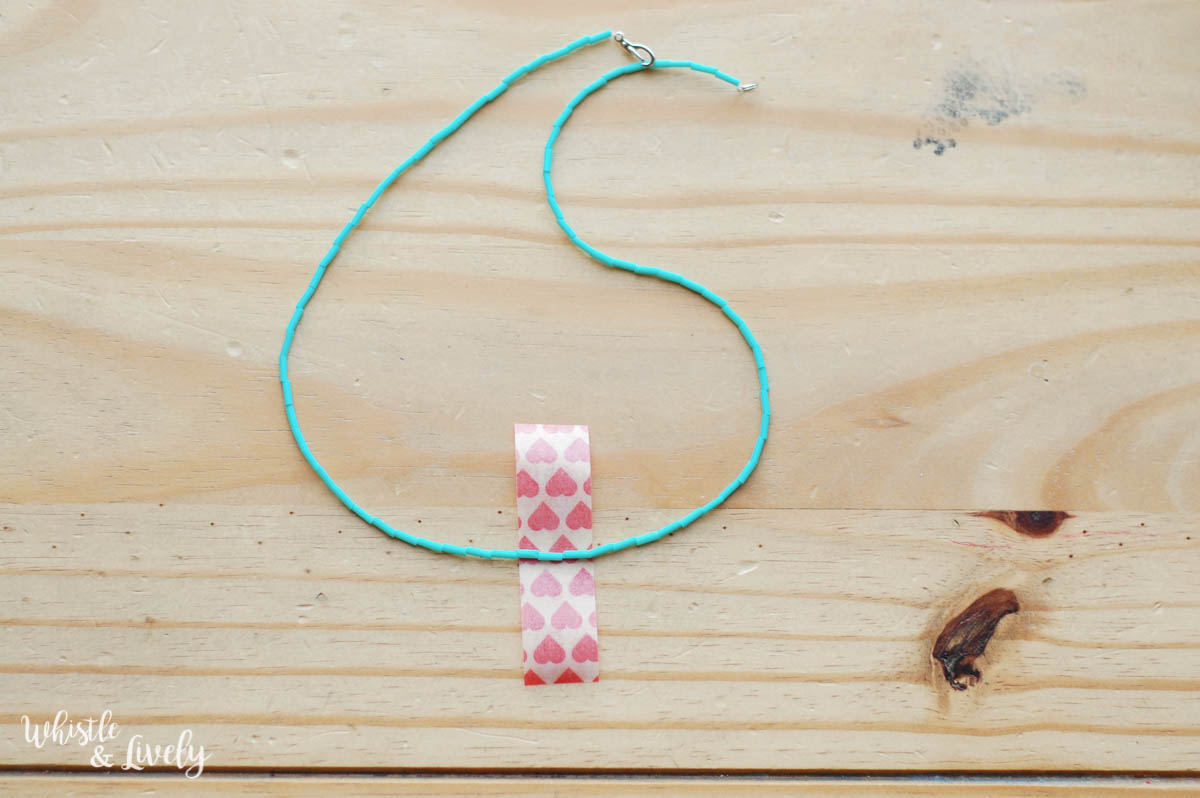 Easy DIY - Washi Tape Necklace | Make this cute, trendy washi tape necklace with a few supplies and in just a few minutes! So many colors to choose from and a perfect craft for kids.